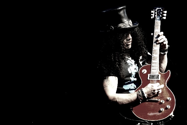 Slash performing live at DTE Energy Music Theatre.