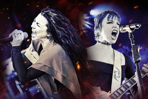 Amy Lee of Evanescence and Lzzy Hale of Halestorm performing live.