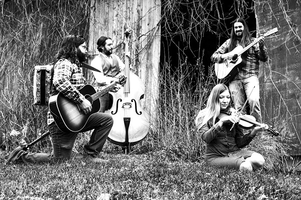 Black and white photo of Michigan folk band The Wild Honey Collective.