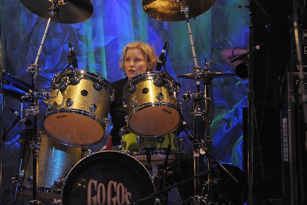 Gina Schock of The Go Go's performing live.