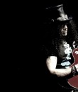 Slash performing live at DTE Energy Music Theatre.