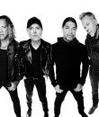 Metallica posing for a black-and-white photo.