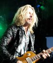 Tommy Shaw of Styx performing live at DTE Energy Music Theatre in Clarkston, Michigan.