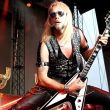 Judas Priest guitarist Richie Faulkner performing live.