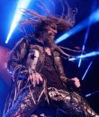 Rob Zombie swinging his dreadlocks during a show at DTE Energy Music Theatre.