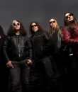 Thrash metal band Testament poses for a promo photograph.