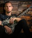 Mark Tremonti of Creed and Alter Bridge poses for a promo photo.