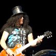 Photo of Slash performing live at DTE Energy Music Theatre in Detroit, Michigan.
