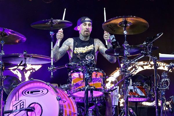 Image of Travis Barker of the punk band Blink-182 performing live.