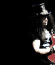 Image of Slash performing live.