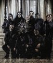 Photograph of Slipknot wearing their creepy masks.