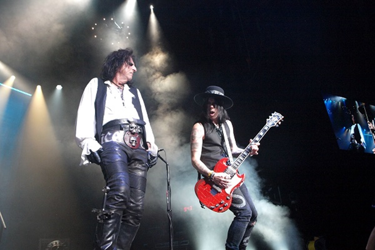 Alice Cooper and Tommy Henriksen performing live at Pine Knob. 
