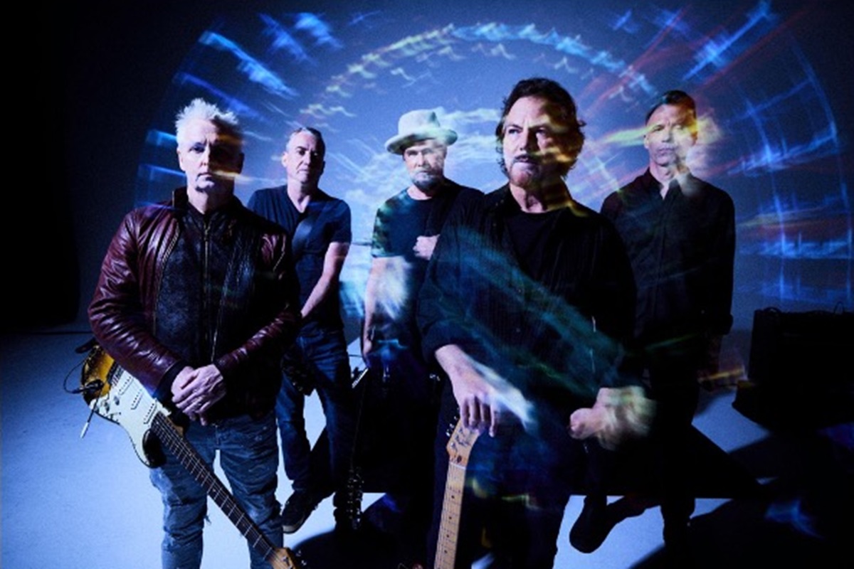 Image of the rock band Pearl Jam with blue lighting.