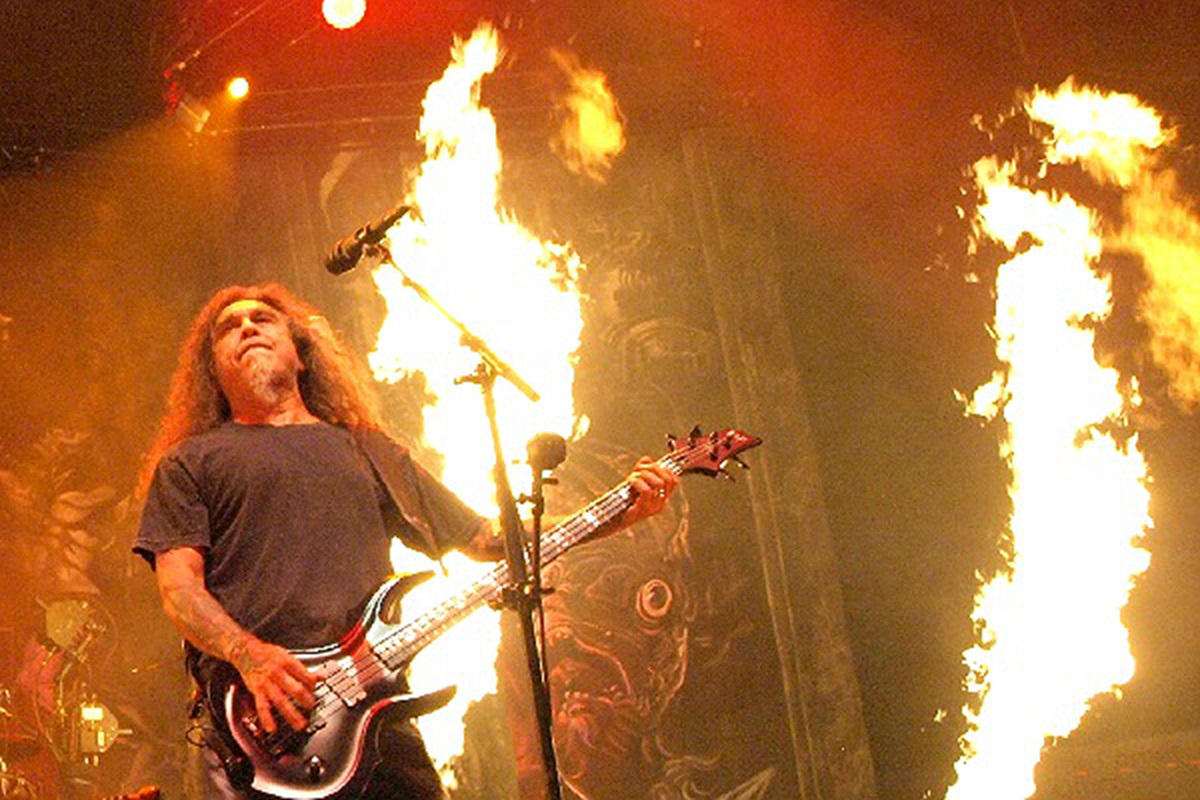 Original photo of Slayer performing live on their farewell tour with fire.